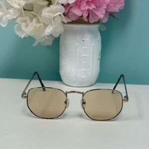 Aire x revolve sagitta sunglasses in gold and ochre tint.